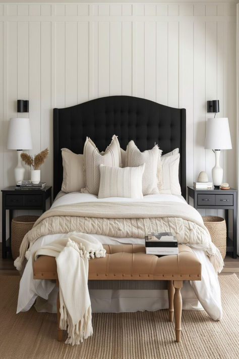 Warm and inviting bedroom with a black upholstered headboard, complemented by neutral bedding and a cozy beige bench. Beige Bed And Black Furniture, Bedding For Black Furniture, Black Bed Frame Beige Bedding, Black Bedroom Decor Beds & Frames, Black Furniture Bedroom Beds & Frames, Bedroom Ideas With Black Furniture, Leather Bed Bedroom, Black Panel Beds, Black Furniture Sets