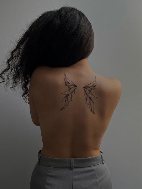 Butterfly, wing tattoo, minimal, moody theme, moody aesthetic, aesthetic post, back tattoo, positive meaning, growth Butterfly Wing Tattoos On Back, Butterfly Wings Back Tattoo, Butterfly Tattoo Pointy Wings, Butterfly Wings Tattoo On Back, Back Fairy Wings Tattoo, Fairy Back Tattoo Wings, Fairy Wing Spine Tattoo, Butterfly Wings Tattoo, Butterfly Sleeve Tattoo