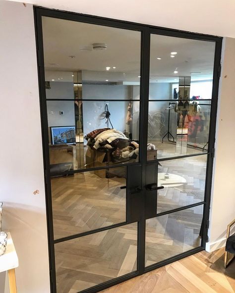 Double fire rated doors for a home gym in central London #crittalldoors #steeldoors #glassdoordesign Basement Gym Doors, Gym Door Ideas, Glass Door Gym, Glass Gym Doors, Home Gym With Glass Doors, Home Gym Doors, Home Gym Glass Doors, Home Gym Door Ideas, Gym Door Design