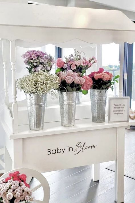 flower bar spring baby shower Baby Bloom Centerpieces, Bloom Bar Baby Shower Ideas, Baby Shower Bouquet Bar, Baby In Bloom Flower Bar, Baby In Bloom Shower Favors, Flower Theme Baby Shower Ideas, Baby Shower Bar Ideas, Flower Bar Baby Shower Ideas, Baby In Bloom Favors