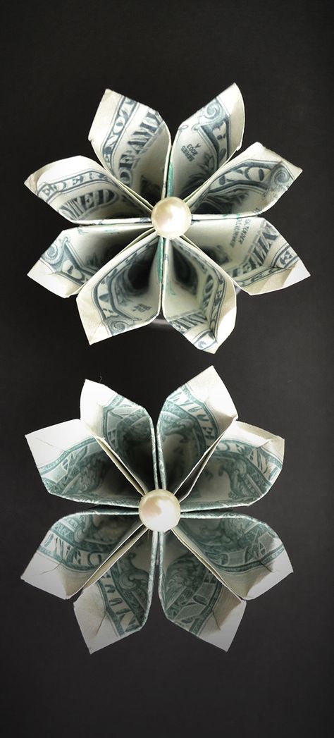 The money flower is a beautiful and easy origami out of two dollar bills. You can use it like a decoration for a graduation lei. The idea and design by Anastasia Prokuda. I wish you a pleasant viewing! Subscribe to my channel! Flowers Made From Money Dollar Bills, Easy Diy Money Lei Graduation, Money Lei Flower, How To Make A Flower Out Of A Dollar Bill, Making Flowers Out Of Money Dollar Bills, Money Cupcakes Ideas Dollar Bills, Make Flowers Out Of Money, Cash Flowers Dollar Bills, Origami Flowers With Dollar Bills