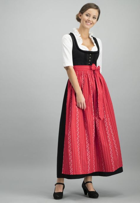 Black Dirndl with white blouse and Apron, also available separately. Long dirndl Zenta with apron and blouse for women in black. The classic dirndl made of a high-quality, easy-care fabric impresses with many lovely details. The bodice with its simple elegance and with the lovingly incorporated trimmings and decorative ribbons is provided with typical traditional buttons. The long skirt with a pocket is elegantly pleated. Red Apron, German Dress, Dirndl Blouse, Women In Black, Dirndl Dress, Blouse For Women, Folk Costume, Simple Elegance, White Blouse