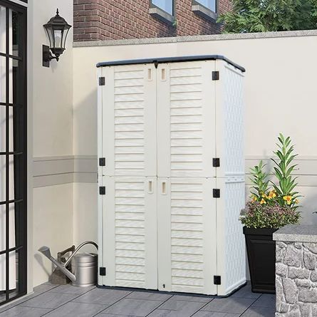 KINYING Outdoor Weather Resistance 4 ft. 2 in. W x 2 ft. 5 in. D Resin Vertical Tool Shed | Wayfair Alley Storage, Outdoor Storage Ideas Waterproof, Outdoor Freezer, Outdoor Storage Ideas, Outdoor Tool Storage, Carport Ideas, Garage Designs, Outdoor Shelves, Outdoor Organization