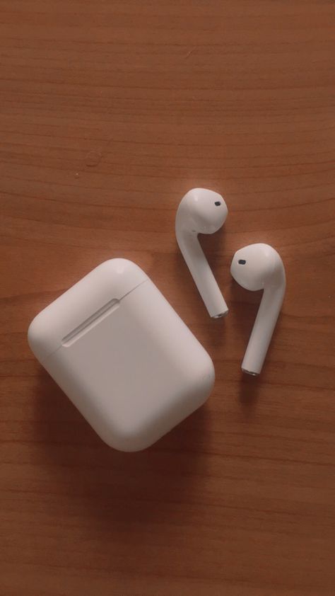 White AirPods 
White case
Brown table
Aesthetic AirPods Phone And Earphones Aesthetic, Airpods Aesthetic Wallpaper, Airpods 2 Aesthetic, Earphone Aesthetic, Air Pods Aesthetic, Airpod Aesthetic, Deepavali Message, Headphone Collection, Earphones Aesthetic