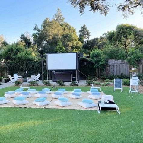 ✨🎬 **Outdoor Movie Night Birthday Bash** 🎬✨ Think cozy white and blue hues, plush pillows, jute rugs, and an endless supply of freshly popped popcorn 🍿 straight from our retro popcorn machine! 🌾✨ We’ll create the perfect ambiance for an unforgettable birthday celebration, with all the magic of a backyard cinema experience 🎥🌟. Whether it’s a kids' party or a milestone birthday, we’ve got you covered! Let us handle the details—you bring the fun! 🎈 📅 Book your next event today and make memori... How To Set Up An Outdoor Movie Night, Outdoor Projector Movie Night, Outdoor Cinema Backyard, Backyard Movie Birthday Party, Outdoor Movie Night Birthday Party, Kids Movie Party, Outdoor Movie Night Party, Retro Popcorn, Backyard Movie Night Party