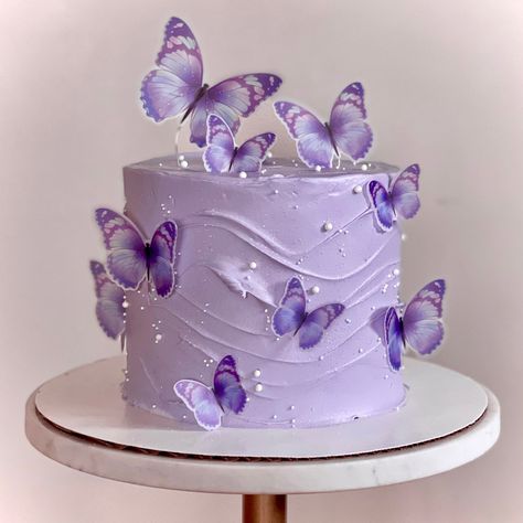 purple butterfly wave cake Lilac Cake With Butterflies, Purple Butterfly Theme Cake, Purple Kids Birthday Cake, Purple Cake Butterfly, Cakes For 7th Birthday Girl, Butterfly Cake Ideas Birthdays, Purple Butterfly Cakes, Speak Now Birthday Cake, Lavender Butterfly Cake