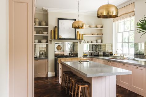 Above: The new kitchen, installed in place of the religious order’s canteen, has custom cabinets painted Farrow & Ball Setting Plaster. The brass lights are a vintage Italian design. Setting Plaster Kitchen, Plaster Kitchen, Setting Plaster, Low Sofa, Brass Kitchen, Bespoke Interiors, Pink Kitchen, Interior Stylist, French House