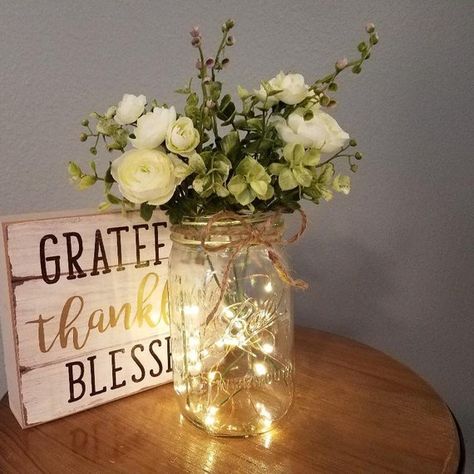 Hanging Floral Decor, Wedding Centerpieces Mason Jars, Beautiful Wedding Centerpiece, Fairy Lights Wedding, Mason Jar Centerpiece, Lighted Centerpieces, Deco Champetre, Lights Wedding Decor, Lights Wedding