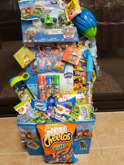 Auction Basket Themes, Paw Patrol Easter Basket, Disney Gift Basket, Sienna Bedroom, Business Gift Baskets, Gremlins Art, Super Kitties, Birthday Candy Bouquet, Alcohol Bottle Crafts