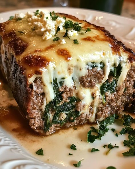 Stuffed Meatloaf with Spinach and Feta Melted Swiss Cheese - SavorySplash Spinach And Cheese Stuffed Meatloaf, Spinach Beef Recipes, Meatloaf With Spinach, Mediterranean Meatloaf, Spinach Meatloaf, Cheese Stuffed Meatloaf, Stuffed Meatloaf, Homemade Meatloaf, Turkey Cheese