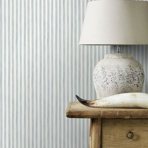 A smart and innocent watercolour stripe brings a charming touch to your walls. Please note This design is a free pattern match. Seen here in the Pastel Blue  White colourway. Neutral Bathroom Wallpaper, Striped Bathroom Walls, Blue Wallpaper Bedroom, Stripe Wallpaper Bedroom, Serena And Lily Wallpaper, Nursery Wallpaper Boy, Blue Stripe Wallpaper, Lime Wash Walls, Brown Nursery