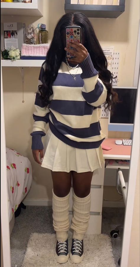 Picture of a girl wearing a fall/winter outfit; Striped white and blue sweater, pleated white skirt, eggshell leg warmers, black Converse. Pleated White Skirt, White And Blue Sweater, Leg Warmers Outfit, Denim Aesthetic, 2024 Fits, White Skirt Outfits, Converse Hi, 6th Form, Secret Box