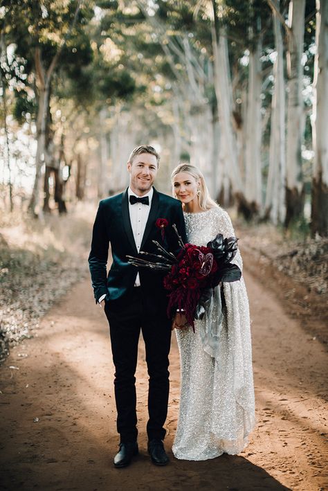 Moody and elegant wedding with groom in dark green velvet blazer and bride with large dark red bouquet Green Wedding Suit, Dark Green Wedding, One Day Bridal, Groom Wedding Attire, Wedding Suits Groom, Hello May, Bridal Magazine, Moody Wedding, Tuxedo Wedding