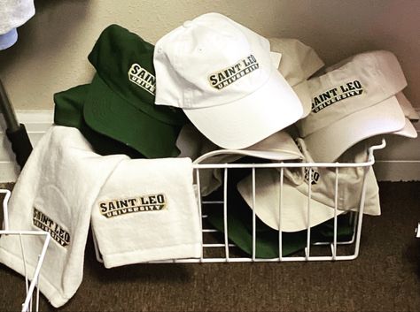 Retail merch for Saint Leo University! College Merch Aesthetic, Mark Cafe, College Crew Neck T-shirt With Branding, School Merch Ideas, University Merchandise Design, College Merch Ideas, Saint Leo University, University Logo T-shirt For Streetwear, Sporty Crew Neck T-shirt With University Logo