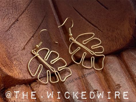 Handmade Monstera Leaf earrings & more found @the.wickedwire on Facebook & Instagram! Monstera Leaf Earrings, Tattoo Design Book, Design Book, Monstera Leaf, Leaf Earrings, Facebook Instagram, Wire Jewelry, Tattoo Design, Book Design