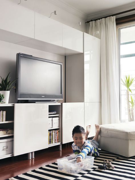 A TV storage solution that grows as your needs do. From big to small, the BESTÅ unit can be adjusted, modified and grown to suit your needs and style. Ikea Besta Diy, Built In Tv Wall, Sliding Door Storage, Built In Tv Wall Unit, Built In Tv, Besta Ikea, Ikea Living Room, Tv Storage, Ikea Besta