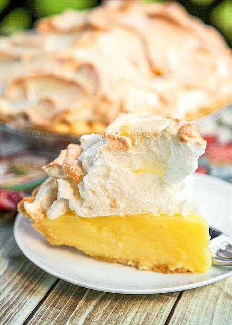 Best Ever Lemon Meringue Pie - homemade lemon pie topped with a quick homemade meringue. (sugar, cornstarch, eggs, milk lemon juice, butter, lemon zest) The pie is ready for the oven in about 10 minutes! This is seriously the BEST lemon meringue pie we've ever eaten! Great for summer cookouts! #pie #meringue My T Fine Lemon Meringue Pie, Classic Lemon Meringue Pie, Easy Lemon Pie Filling Recipes, Lemon Pies Recipes, Old Fashioned Lemon Meringue Pie, Homemade Lemon Pie Filling, Lemon Pie Filling Recipes, Grandma's Lemon Meringue Pie Recipe, Fluffy Meringue