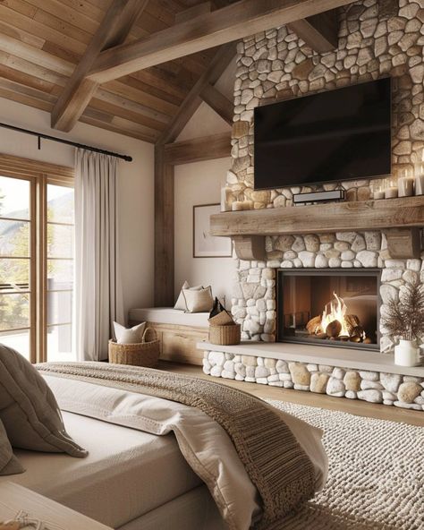 42 Bedroom Fireplace Decor with TV Ideas - Home Soils Stacked Stone Fireplace With Built Ins On Both Sides, Valcourt Fireplace, Tv Above Wood Burning Stove, Stone Fireplace Ideas With Tv, Stone Wall Fireplace With Tv, Rustic Electric Fireplace Ideas, Bedroom With Fireplace Master, Stone Fireplace With Tv, Fireplace With Wood Storage