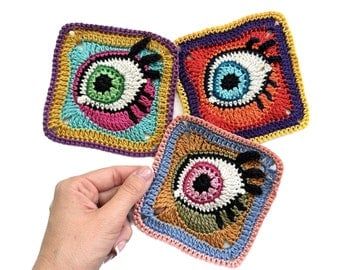 Granny Square Crochet Pattern with Videos Dark Crochet, Evil Eye Crochet, Eye Crochet, Square Crochet Pattern, Crochet Throw Pattern, Crochet Eyes, Crochet Coaster Pattern, Crochet Mandala Pattern, Easy Crochet Projects