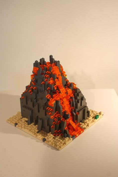 Lego Pirates MOC • Lego Volcano | Volcan Lego | Hannibal Joost | Flickr Lego Volcano, Lego Fish, Volcano Project, Lego Zoo, Volcano Model, Volcano Projects, Lego City Train, Orange Plates, Lego Pirates