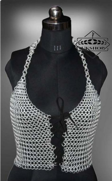 Handmade female chainmail bra, top, halter.made by light weight aluminium & inner ring diameter is 10mm This chainmail top finished aluminium anodised rings in natural silver color finished coated aluminium rings and close neck & back with cotton laces.

Ring Size: 10 mm
Length from shoulder: 25 inches
Ring Type: Butted
Material: Aluminium
Featured Refinements: Chainmail
Gender: Women
Color: Silver
Modified Item: No
Style: Armor
Country/Region of Manufacture: India
Brand: Handmade Chain Mail Top, Medieval Clothing Men, Handmade Bra, Chainmail Shirt, Chainmail Armor, Chainmail Top, Ren Faire Costume, Stylish Bra, Fancy Top