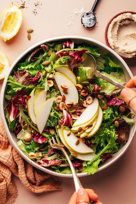 Using a serving spoon and fork to toss a salad Salad Food Photography, Vegan Goat Cheese, Toss Salad, Vegan Sweet Potato Pie, Vegan Green Bean Casserole, Thanksgiving Salad, Gluten Free Stuffing, Asian Pear, Crispy Shallots