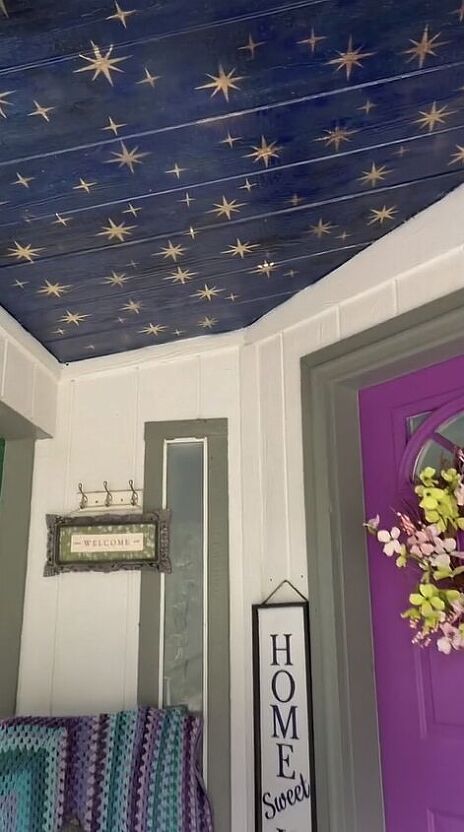 I painted a celestial mural on the ceiling of my front porch. This was inspired by the Wizarding World of Harry Potter at Universal Studios in Orlando. At one Wiseacres Wizarding Equipment in Diagon Alley there is a beautifully painted celestial mural. I have been looking for the perfect spot in my home to do something similar. I decided to do paint one on the ceiling of my front porch. This is the porch before. It was plain white. The siding is made of vinyl that has a texture on i… Ceiling Painting Ideas Murals, Gold Leaf Star Ceiling, Statement Ceiling Bedroom, Slanted Ceiling Mural, Whimsigoth Ceiling, Celestial Ceiling Diy, Starred Ceiling, Witchy Ceiling Decor, Painted Star Ceiling