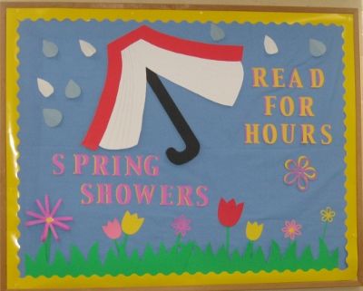 This attractive spring bulletin board is found in the church library ... Spring Door Decorations For School, Door Decorations For School, Spring Door Decorations, Easter Boards, Spring Library, Decorations For School, April Bulletin Boards, School Library Bulletin Boards, March Bulletin Board