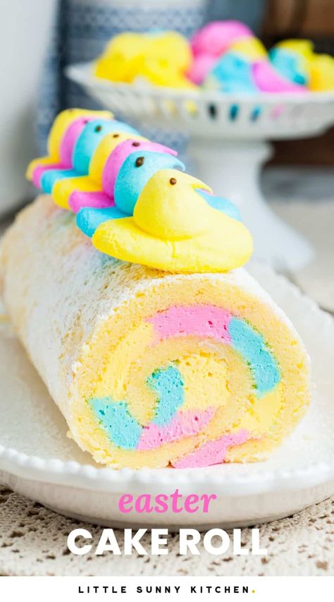 This easy Easter Cake Roll is a light and fluffy vanilla cake wrapped around marshmallow buttercream and topped with cute marshmallow peeps. Easter Cake Roll, Easter Cake Easy, Peeps Cake, Unfrosted Cake, Little Sunny Kitchen, Marshmallow Buttercream, Sunny Kitchen, Cute Marshmallows, Cake Roll Recipes