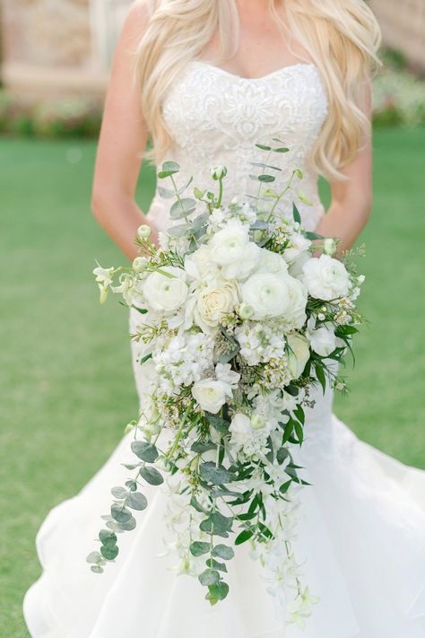 Trailing white and greenery bridal bouquet White Bridal Bouquet With Greenery Cascading, Cascading Wedding Bouquets White And Green, 2023 Bride Bouquet, Orchard Wedding Bouquet, Cathedral Bouquet Bridal, Bridal Bouquet August Wedding, Cascading White Wedding Bouquets, White And Green Cascading Bridal Bouquet, Wisteria Bouquet Wedding