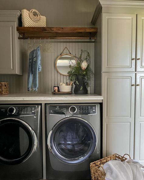 See what magic a little paint can do? This laundry room began as nothing remarkable, but through the simple acts of removing a few cabinets and introducing beadboard, a hanging rod, charming hardware, and wall-to-wall countertops, it’s a whole new room. Not only is it visually transformed, but it’s now exponentially more practical as well. ✨ • • • #interiordesign #endlesspossibilities #designforeveryone #interiors #midwestdesigner #AKDesignStudio #akdsjadestoneplace #laundryroommskeover Laundry Room Ideas Hanging Rod, Laundry Room With Window Above Washer, Laundry Room With Hanging Rod, Beadboard Laundry Room, Utility Room Decor, Laundry Room Colors, Utility Room Ideas, Bead Board Walls, Home Restoration