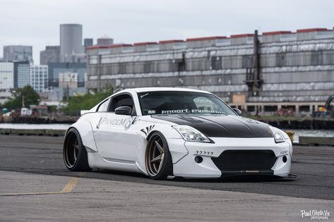 Out Of This World White Nissan 350Z Boasting Rocket Bunny Body Kit — CARiD.com Gallery 350z White, Nissan 350z Wallpapers, White Nissan, Nissan Z Cars, Rocket Bunny, Stanced Cars, R35 Gtr, Best Jdm Cars, Nissan Z