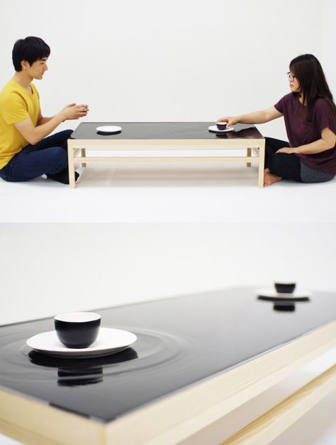 'Ripple Effect Tea Table' installation by industrial designer jeonghwa seo is a reflection of eastern mentality towards social relationships. Ripples are created on the top water layer of the table surface everytime the tea cup   and saucer are moved by the user. Table Installation, Social Relationships, Ripple Effect, Table Surface, Iconic Furniture, Multifunctional Furniture, Design Magazine, Tea Cup And Saucer, Engineering Design