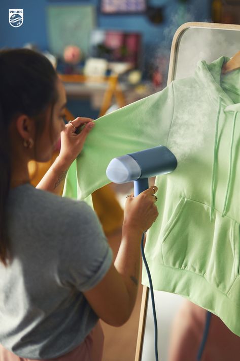 When steaming clothes with your Philips garment steamer, be sure to stretch them with your free hand to get rid of all those small crinkles and creases. Discover more tips at our link.​ Steaming Clothes, Kitchen Materials, Iron Clothes, Grill Sandwich Maker, Handheld Steamer, Clothes Steamer, Mens Tools, Making Lunch, Garment Steamer