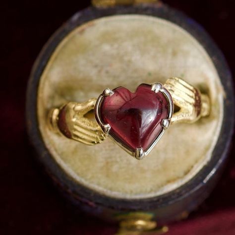 Gaetano Chiavetta on Instagram: "❤️🫶🏻❤️‍🔥😱 Inspired by the traditional Claddagh ring, this piece is crafted in 18 kt yellow gold, with a Sterling silver collet and set, at the centre, with a beautiful heart shaped garnet, in a cut down setting. The garnet at the centre measures 9x9 mm. Size: 7.1/4 Weight: 2.6 grams. Available here and now. Just please DM 😘 #gaetanochiavetta #heartring" Night Jewelry, Stone Flowers, Silver Claddagh Ring, Diy Jewelry Rings, Ring My Bell, Claddagh Ring, Best Engagement Rings, Claddagh Rings, Garnet Ring