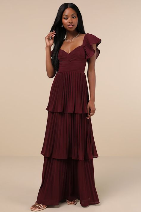 Everyone will instantly notice your sensational sense of style when you strut in wearing the Lulus Notorious Charm Plum Purple Pleated Flutter Sleeve Maxi Dress! Airy, pleated woven chiffon shapes this gorgeous dress that features a lightly gathered bodice with a sweetheart neckline and long sashes that secure atop an otherwise open back, all framed by fluttery short sleeves (with elastic at the shoulders). The high, fitted waist tops a flowy, tiered A-line skirt that cascades down to a ... Long Winter Dress Casual, Winter Formal Dresses With Sleeves, Wedding Guest Maxi Dress Fall, Dressed To Wear To A Wedding As A Guest, Prom Dresses Flowy Sleeves, Plum Colored Dress, February Bridesmaid Dresses, Sweethearts Dance Dresses, Moody Bridesmaid Dresses