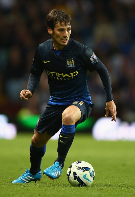 David Silva of Manchester City in action during the Barclays Premier League match between Aston Villa and Manchester City at Villa Park on October 4, 2014 in Birmingham, England. David Silva, Barclays Premier League, Villa Park, Birmingham England, Premier League Matches, October 4, Man City, Aston Villa, Manchester City