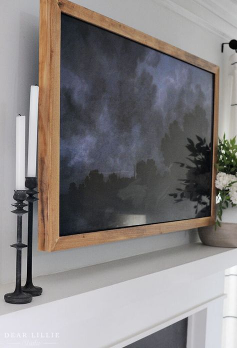 Canvas Over Tv, Making A Frame For Tv, Frame Behind Tv, Wall Tv Frame Ideas, Lamp Under Tv, How To Make A Tv Frame, Framed Tv In Bedroom, Building A Tv Frame, Fake Frame Tv