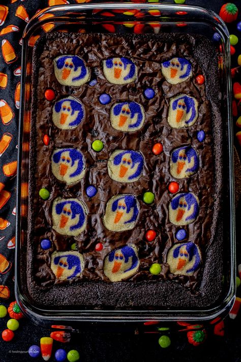 Halloween Desserts For Kids To Make, Halloween Cookie Brownie, Snacks For Halloween Party Kid, Pillsbury Halloween Cookie Brownies, Halloween Desserts For Work, Brownie Recipes Halloween, Spooky Season Desserts, Halloween Brownie Cookies, Pillsbury Halloween Cookies Recipe