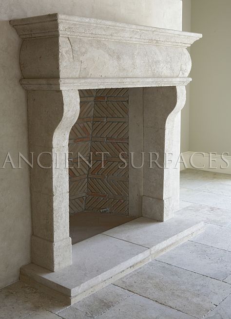 This Italian countryside fireplace was hand carved out of hard limestone installed with an interesting herringbone firebox and running bond brick lines. Gothic Fireplace, Carved Stone Fireplace, Carved Fireplace, Living Room New York, French Fireplace, Candles In Fireplace, Limestone Fireplace, Old Fireplace, Farmhouse Fireplace