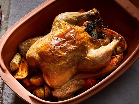 This Römertopf-Roasted Chicken and Root Vegetables recipe gets its flavor from fresh thyme, sweet potatoes, and parsnip. Get the recipe from Food & Wine. Romertopf Recipes, Chicken And Root Vegetables, Clay Pot Cooking Recipes, Recipes Chicken Breast, Root Vegetables Recipes, Best Roasted Chicken, Chicken Roast, Ceramic Baking Dish, Roast Chicken Recipes