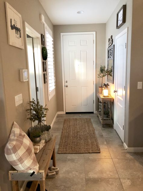 Styling an entryway can be a challenge when it’s small.   #entryway #farmhousestyle #homedecorideas #homedecor #foyer Apartment Entryway Ideas Narrow Hallways, Narrow Hallways, Apartment Entrance, Apartment Entryway, Trendy Apartment, Entry Ways, Small Entryways, Entryway Ideas, Modern Farmhouse Living Room