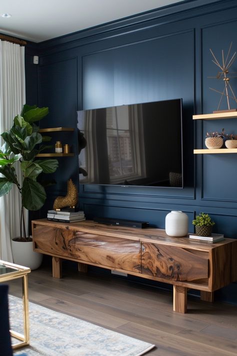 Upgrade your entertainment area with sleek, modern TV wall ideas. Click here to see more. Navy Living Room Accent Wall, Navy Blue Accent Wall Living Room Tv, Navy Living Room Accents, Accent Tv Wall, Blue Accent Wall Living Room, Navy Living Room, Living Room Accent Wall, Blue Room Decor, Navy Living