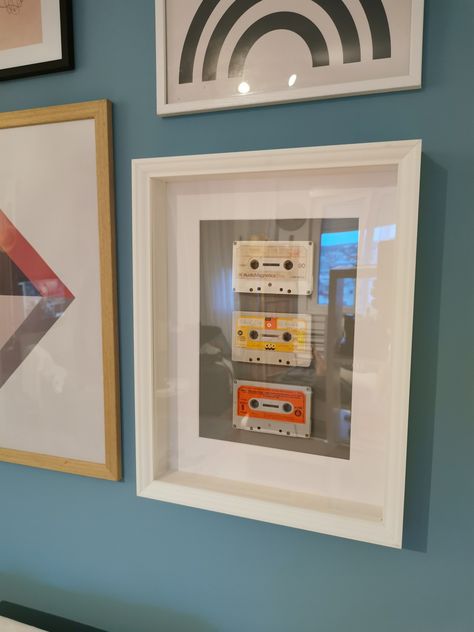 Music cassettes tape diy project Casette Tape Wall Art, Cassette Tape Display Ideas, Cassette Tape Decor, Audio Cassette Art, Cassette Decoration Ideas, Old Cassette Tapes Crafts, Old Frames Ideas Wall Art, Casette Tape Art, Cassette Tape Diy