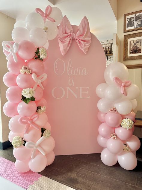 How To Throw the Perfect Bow Themed Party — Zhuzh It Up Pretty In Pink 1st Birthday Party, Bows Party Decorations, Coquette 1st Birthday Party, Bows Theme Birthday Party, Pink Bow Balloon Arch, Coquette 1st Birthday, Pink First Birthday Theme, First Birthday Girl Bow Theme, 1st Birthday Bow Theme