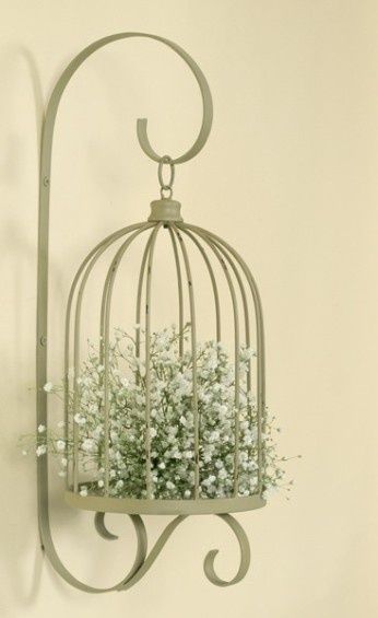 Love this! So classy and elegant! Beautiful and doing this!    Lovely bird cage used as a planter  - bird cage planter - http://thegardeningcook.com/bird-cage-planters/ Birdcage Planter, Bird Cage Candle, Bird Cage Candle Holder, Shabby Chic Decorating, Hanging Bird Cage, Smart Tiles, Bird Cage Decor, Shabby Chic Bedrooms, Chic Bathrooms