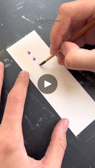 How to make my lavender bookmarks #watercolor #watercolorpainting #watercolorart #bookmarkart #watercolorbookmark #lavender #floral #watercolorflorals #art #artist #paint #painting | How to make my lavender bookmarks #watercolor #watercolorpainting #watercolorart #bookmarkart #watercolorbookmark #lavender #floral #watercolorflorals... | By Hannah pickerill | Here's how I make my
best-selling watercolor lavender bookmarks. Mix up a
water down purple, a saturated purple, and a green and with
that water down purple, you're going to start adding little
flowers. I add these little clusters in imaginary lines and
then I switch to the saturated purple color and add that in
while the paint is still wet so that it gives it a little bit
of depth and detail. And I do this for all of the flower
cluste Bookmarks Watercolor, Purple Bookmark, Watercolor Bookmarks, Lavender Floral, Artist Paint, Paint Painting, Little Flowers, Floral Watercolor, Purple Color