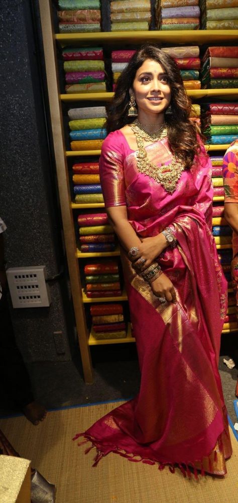 Shriya Saran in a pink pattu saree at shop opening Tomato Pink Saree Contrast Blouse, Rani Pink Pattu Saree, Dark Pink Pattu Saree, Jewellery For Pink Saree, Pink Pattu Blouse Designs, Pink Pattu Saree Contrast Blouse, Onion Pink Saree Contrast Blouse, Pink Bridal Saree, Pink Saree Contrast Blouse