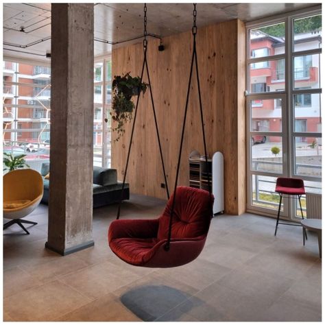 SWING SEATS MADE OUT OF PASSION BY FREIFRAU - Hanging Chairs Hanging Sofa Living Room, Red Lounge Chair, Living Room Swing Ideas, Jula Swing, Swings For Home, Swing In Living Room, Modern Hanging Chairs, Garden Swings, Room Swing