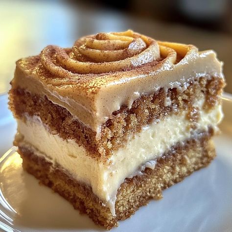 Pumpkin Spice Gooey Cake with Brown Sugar Cream Cheese Frosting  🎃🍰  Ingredients:  For the Cake Base: - 1 box yellow cake mix - 1 large egg - 1/2 cup unsalted butter, melted - 1 cup pumpkin puree - 1 tsp vanilla extract  For the Pumpkin Spice Gooey Filling: - 8 oz cream cheese, softened - 2 large eggs - 1 tsp vanilla extract - 1/2 cup pumpkin puree - 1/2 cup unsalted butter, melted - 1 tsp ground cinnamon - 1/2 tsp ground nutmeg - 1/4 tsp ground cloves - 4 cups powdered sugar  For the Brown Sugar Cream Cheese Frosting: - 8 oz cream cheese, softened - 1/4 cup unsalted butter, softened - 1/4 cup brown sugar, packed - 2 cups powdered sugar - 1 tsp vanilla extract  Directions:  1. Prepare the Cake Base:    - Preheat your oven to 350°F (175°C) and grease a 9x13-inch baking dish.    - In a lar Brown Sugar Cream Cheese Frosting, Brown Sugar Frosting, Gooey Cake, Recipes Pumpkin, Pumpkin Spice Cake, Easy Homemade Recipes, Delicious Pumpkin, Yellow Cake Mixes, Cake With Cream Cheese